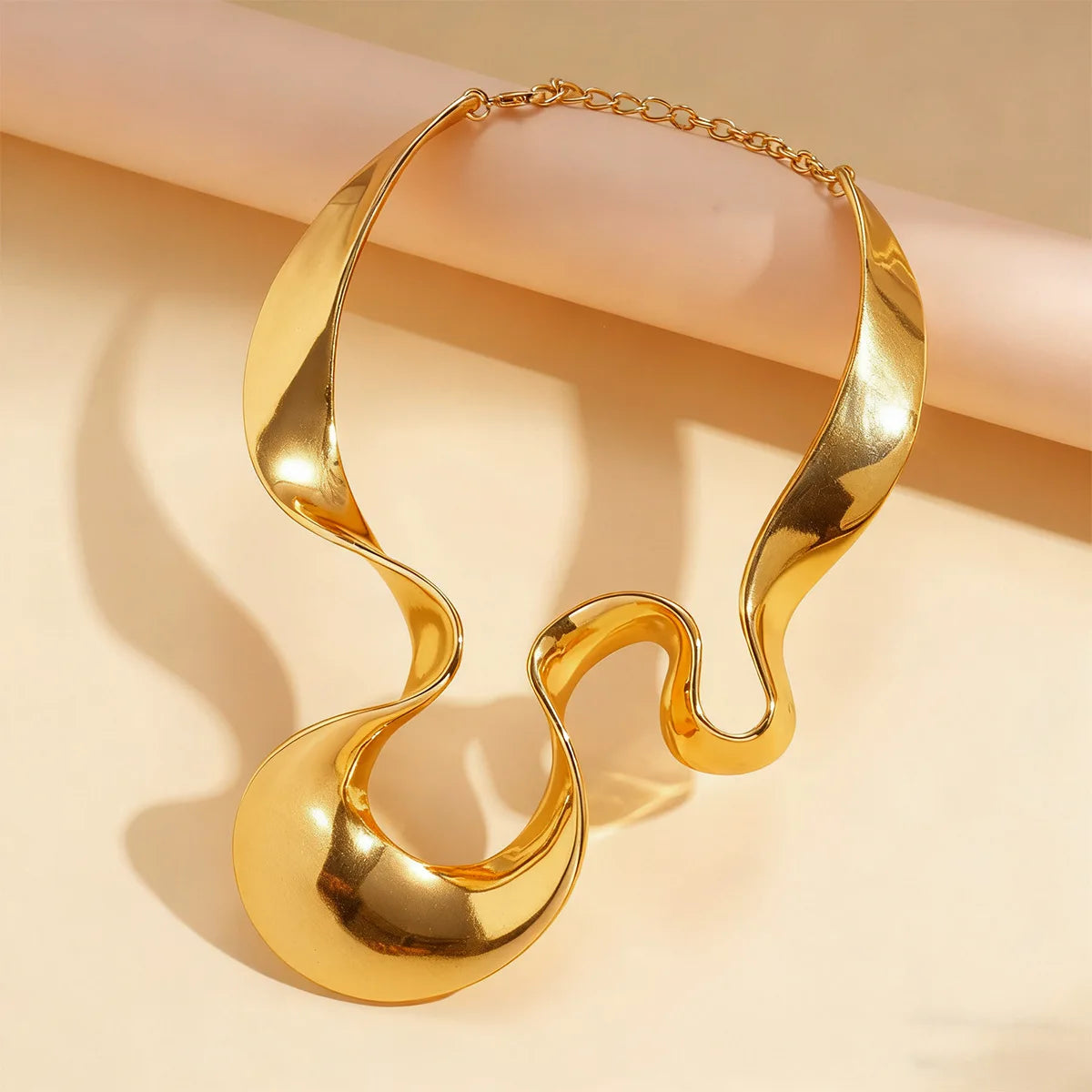 Molten Torque necklace, gold, product shot
